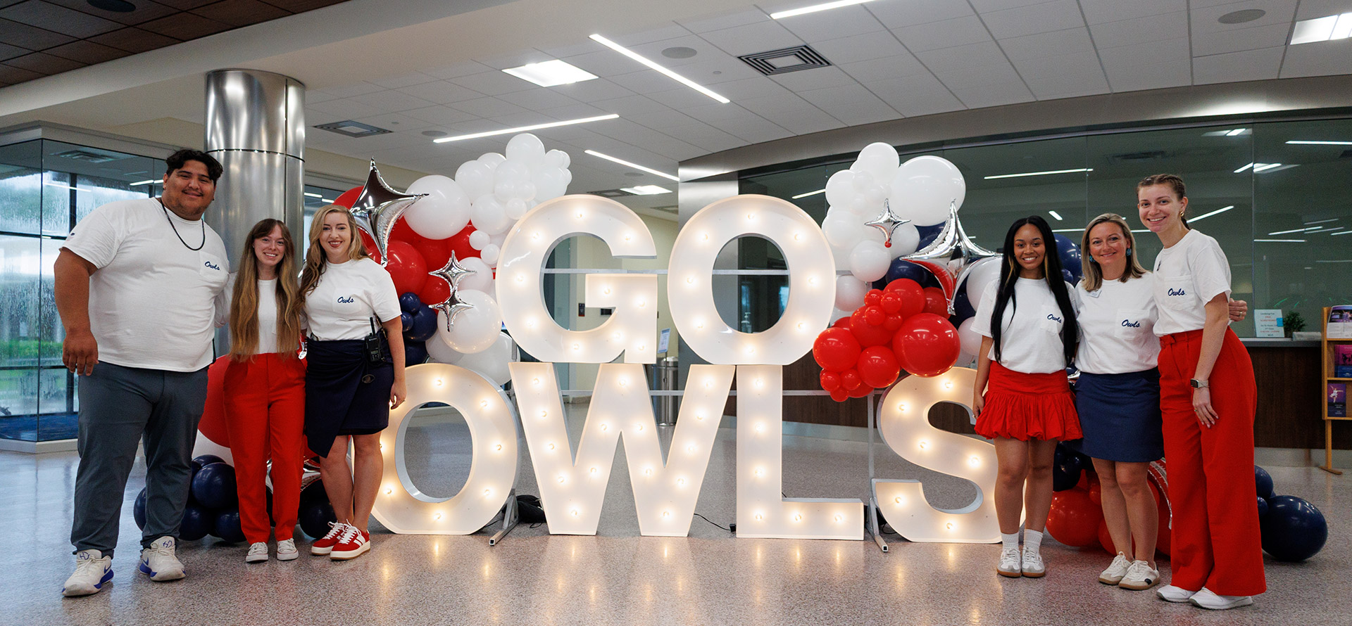 Student using a motorized mobility device on FAU campus