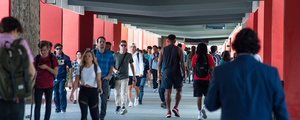 People walking in the breezeway