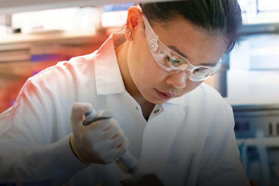 woman in white lab coat