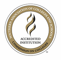 Circular logo of the Southern Association of Colleges and Schools with a flame motif and the words 'Accredited Institution'.