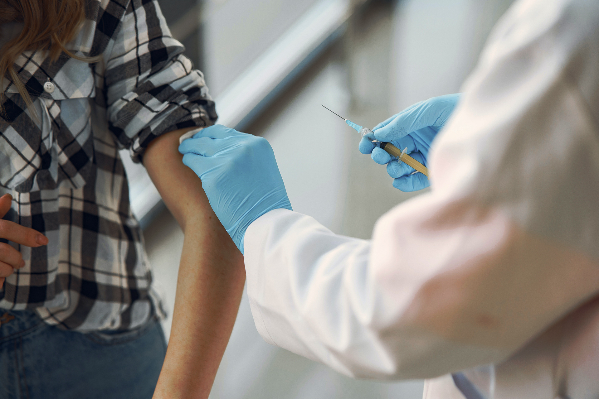Traveler receiving vaccine