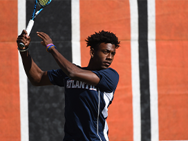 Male tennis player during a match.
